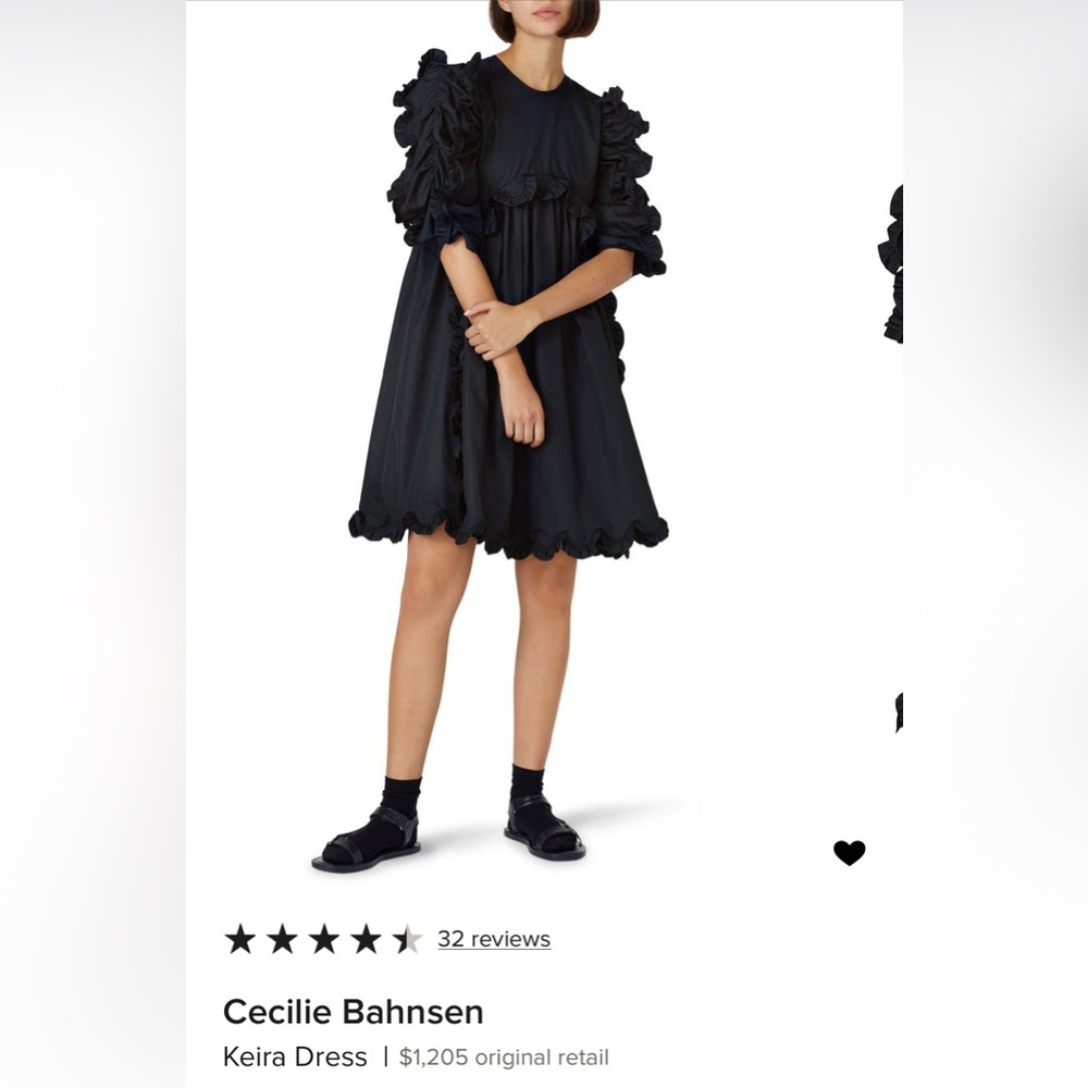 Cecilie Bahnsen Tent Dress
Pleated Ruffle Accents
Crew Neck
Sash-Tie Closure